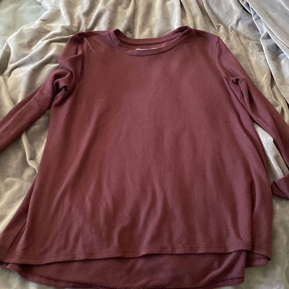 Beautiful long-sleeved blouse in very good condition
